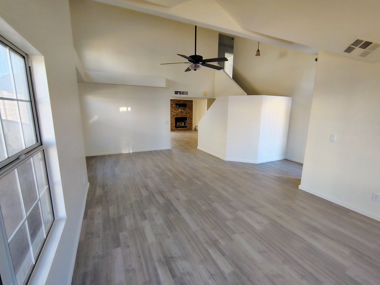LVP living room floor complete vaulted ceiling Tucson AZ