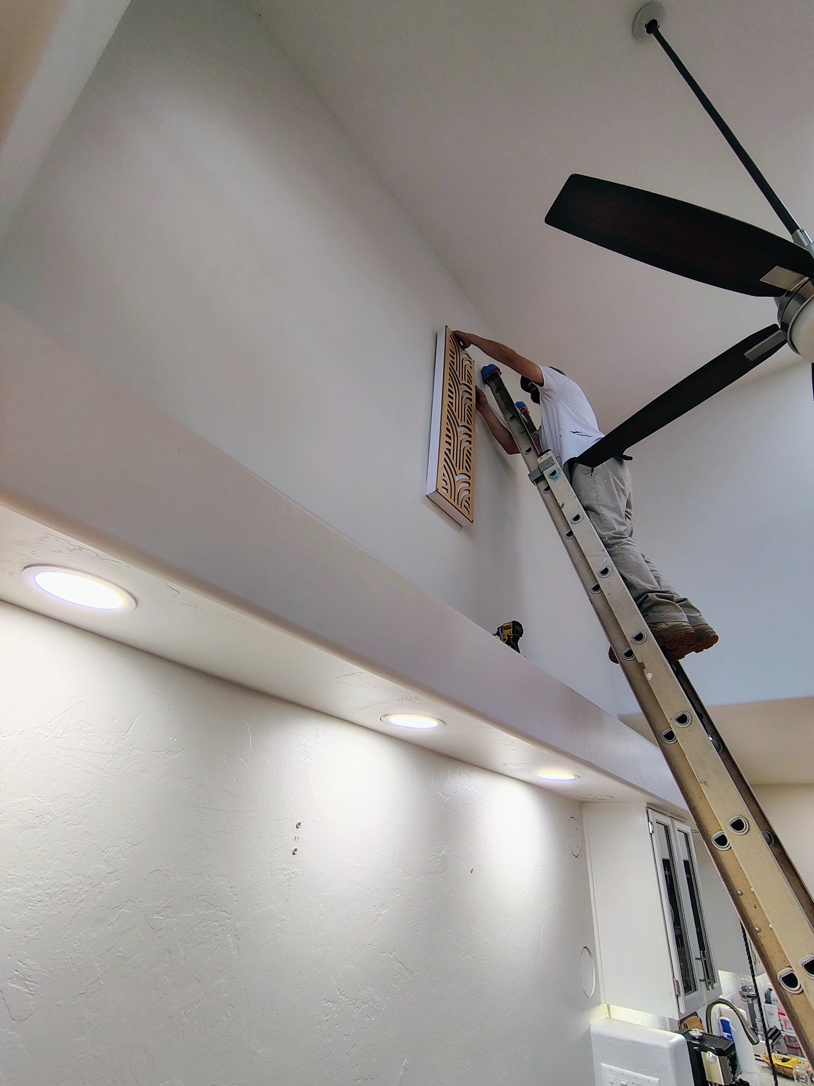 Wall art installation with recessed lights Tucson AZ